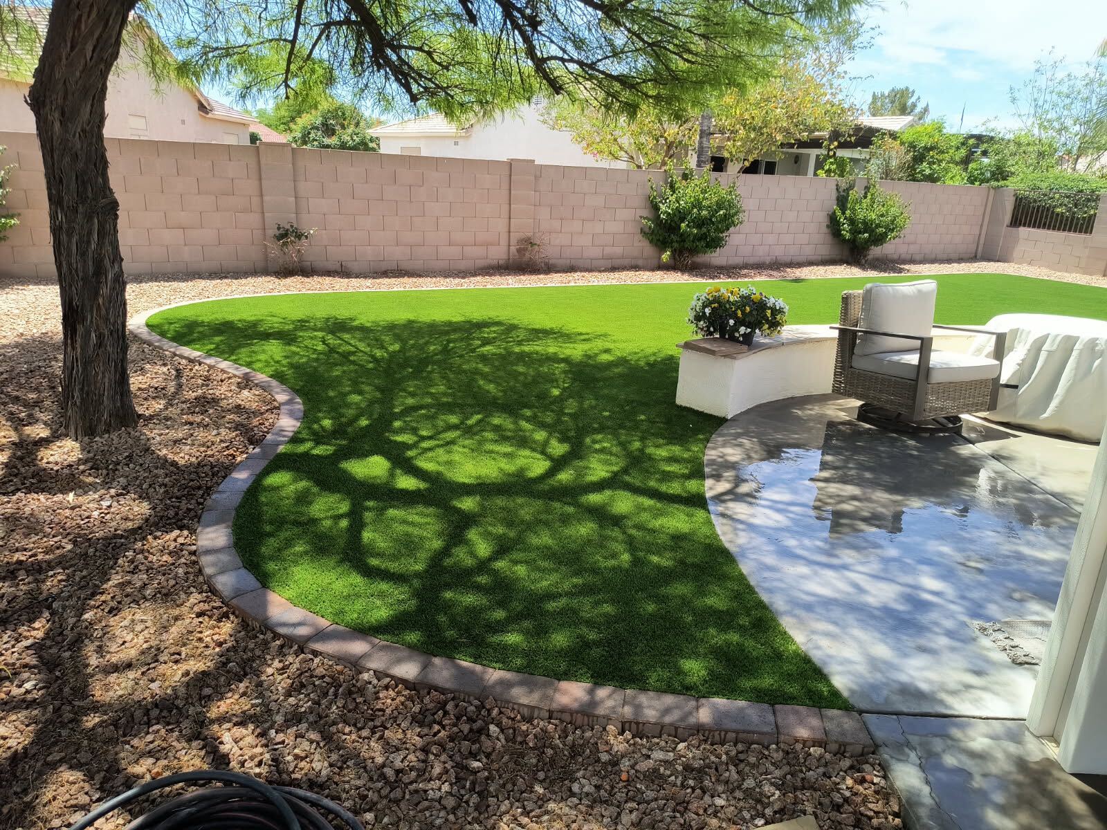 Backyard artificial lawn with patio Arizona