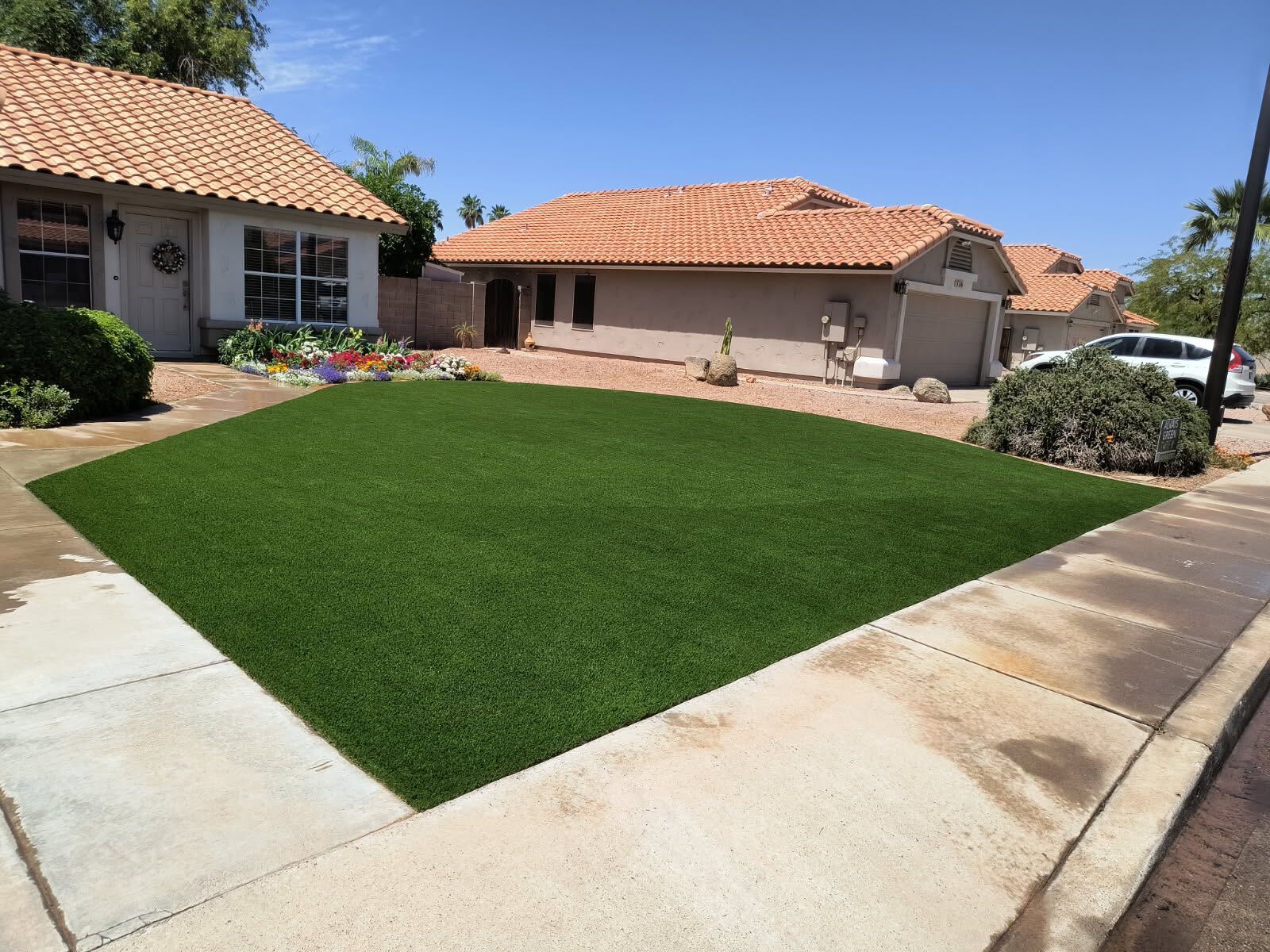 Front yard synthetic turf suburban home Arizona