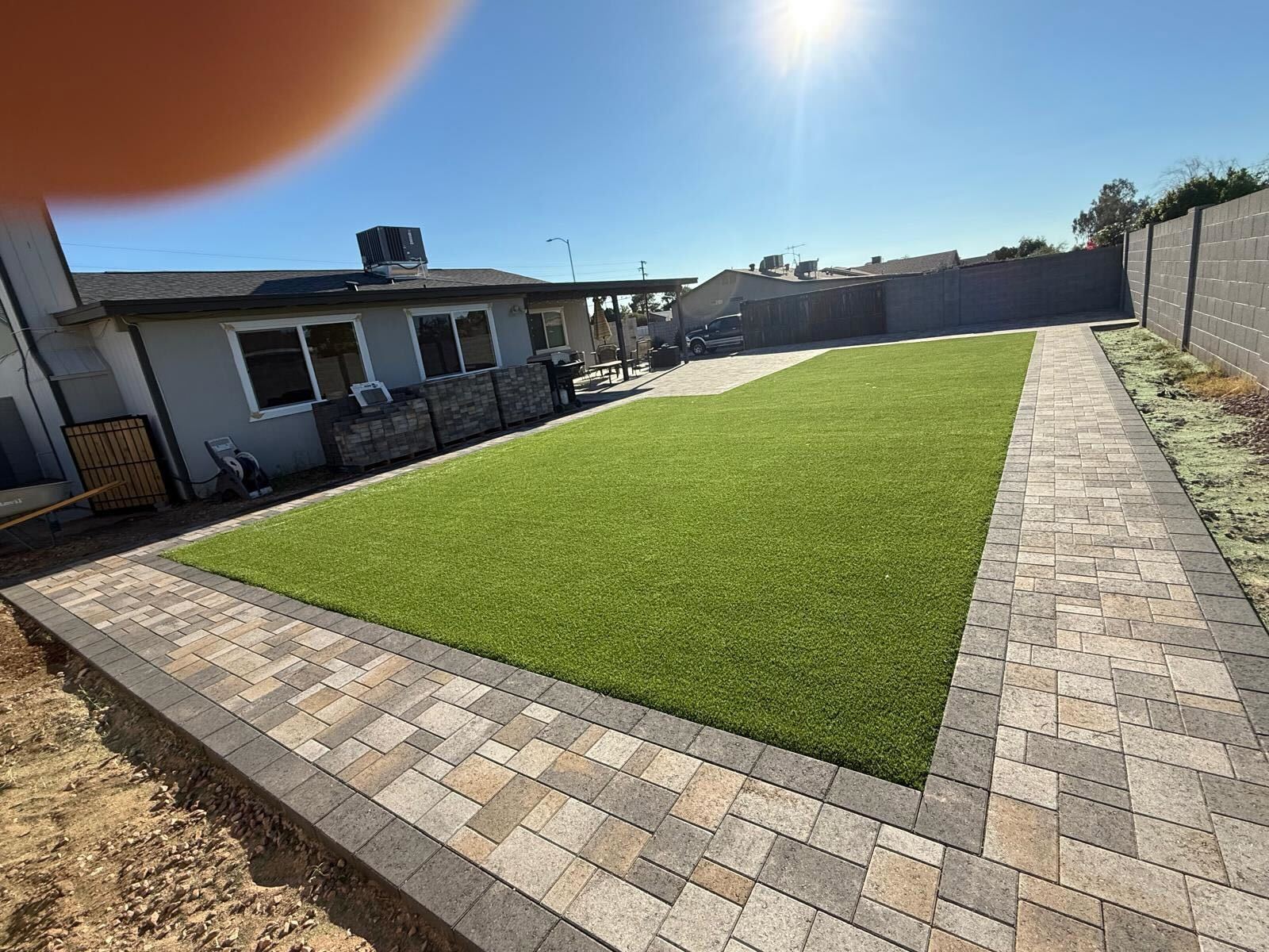 Paver patio installation in Phoenix Arizona backyard