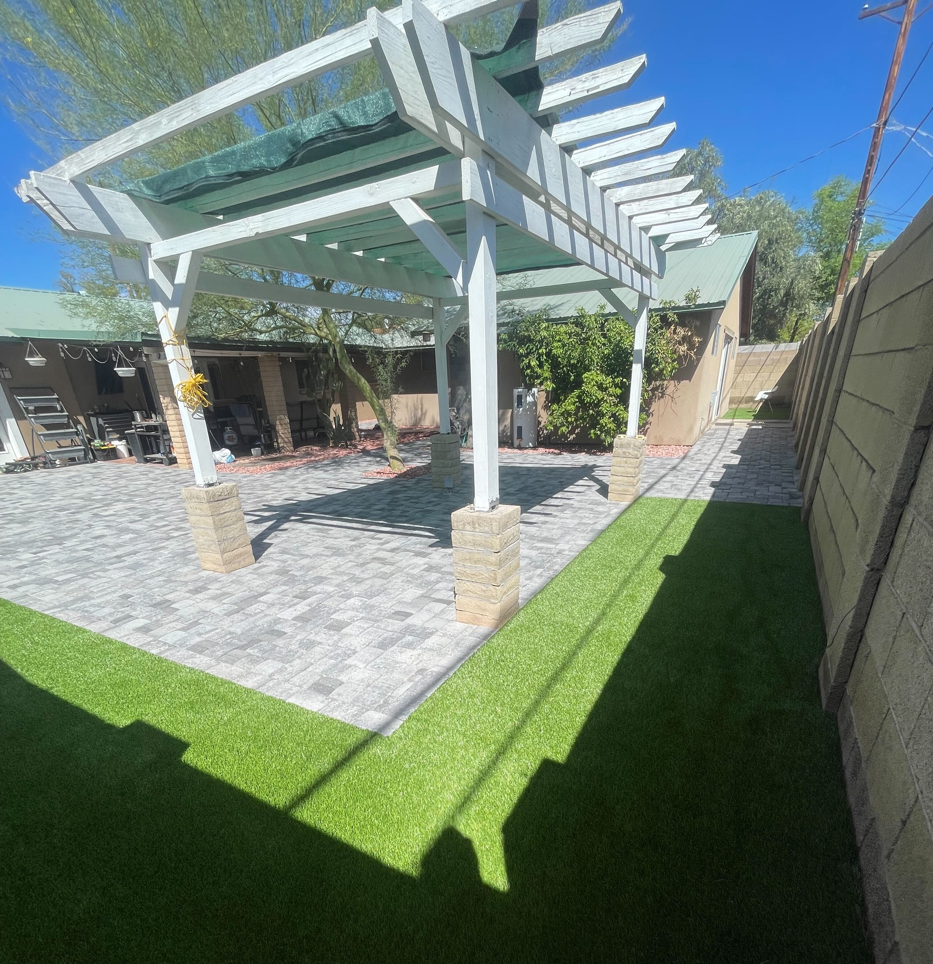 Pergola patio cover with outdoor seating area in Arizona