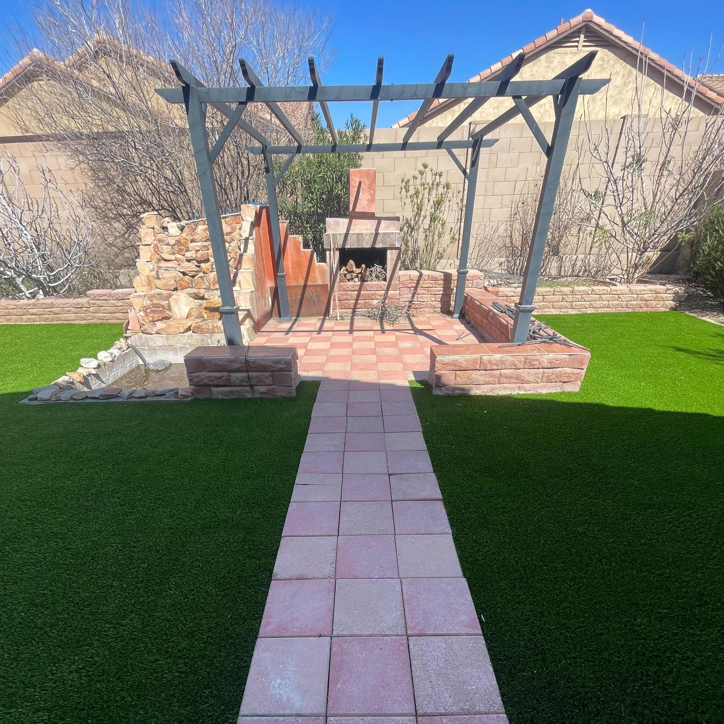 Composite pergola providing shade for outdoor entertaining