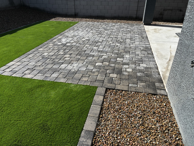 Zero-maintenance rock yard with professional weed barrier