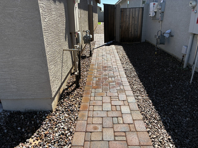 Natural boulder and river rock Arizona landscape design